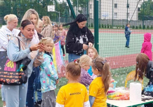 Malowanie twarzy,kolorowe warkoczyki